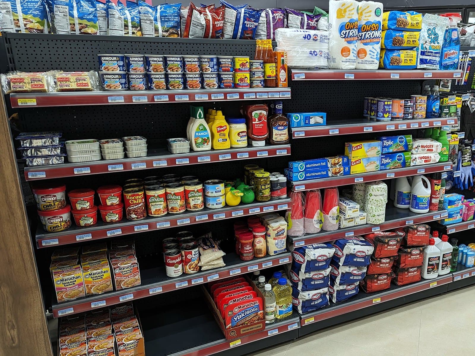 Shelf of groceries and household basics